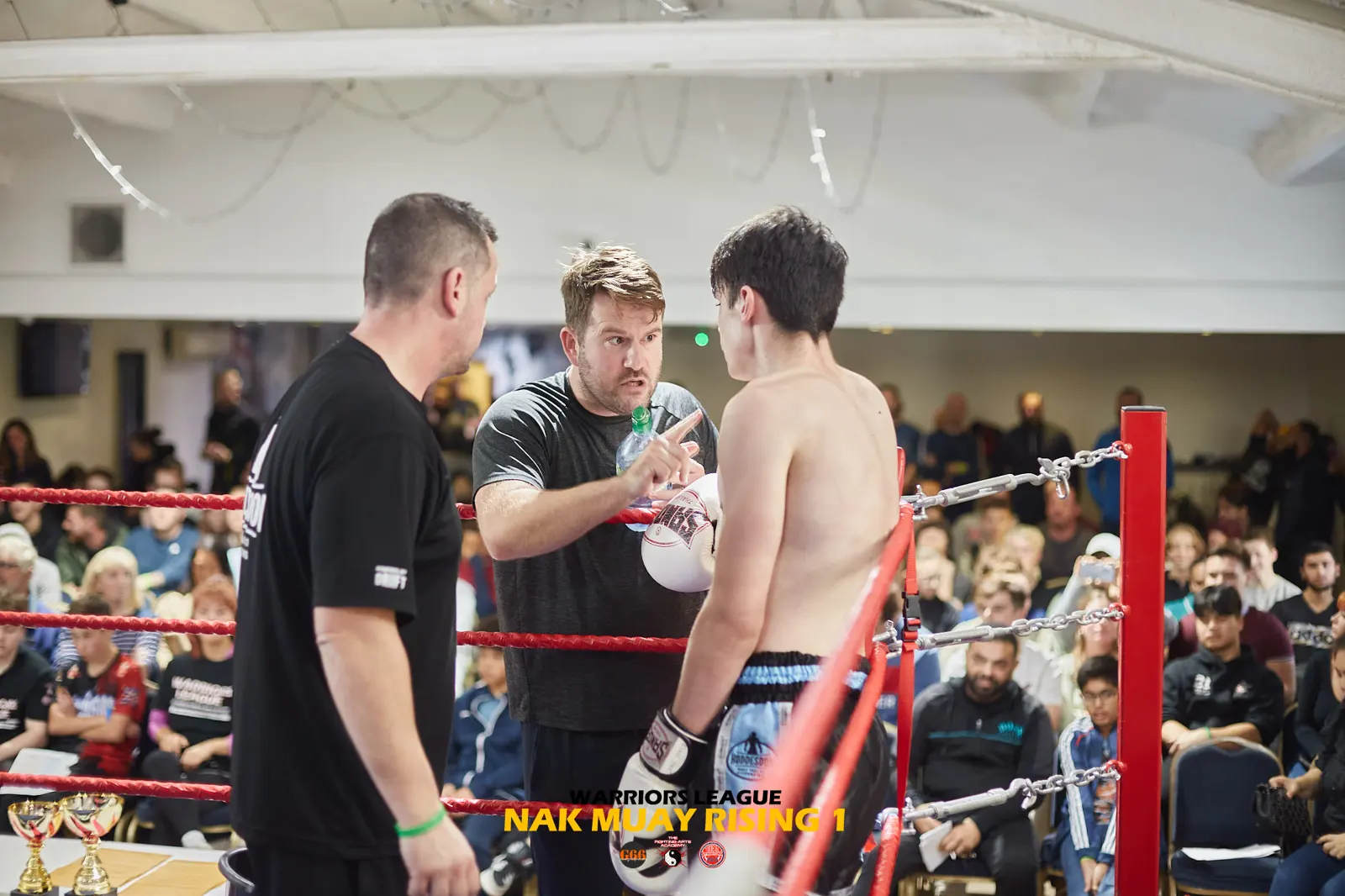 Coaches in the corner before a bout