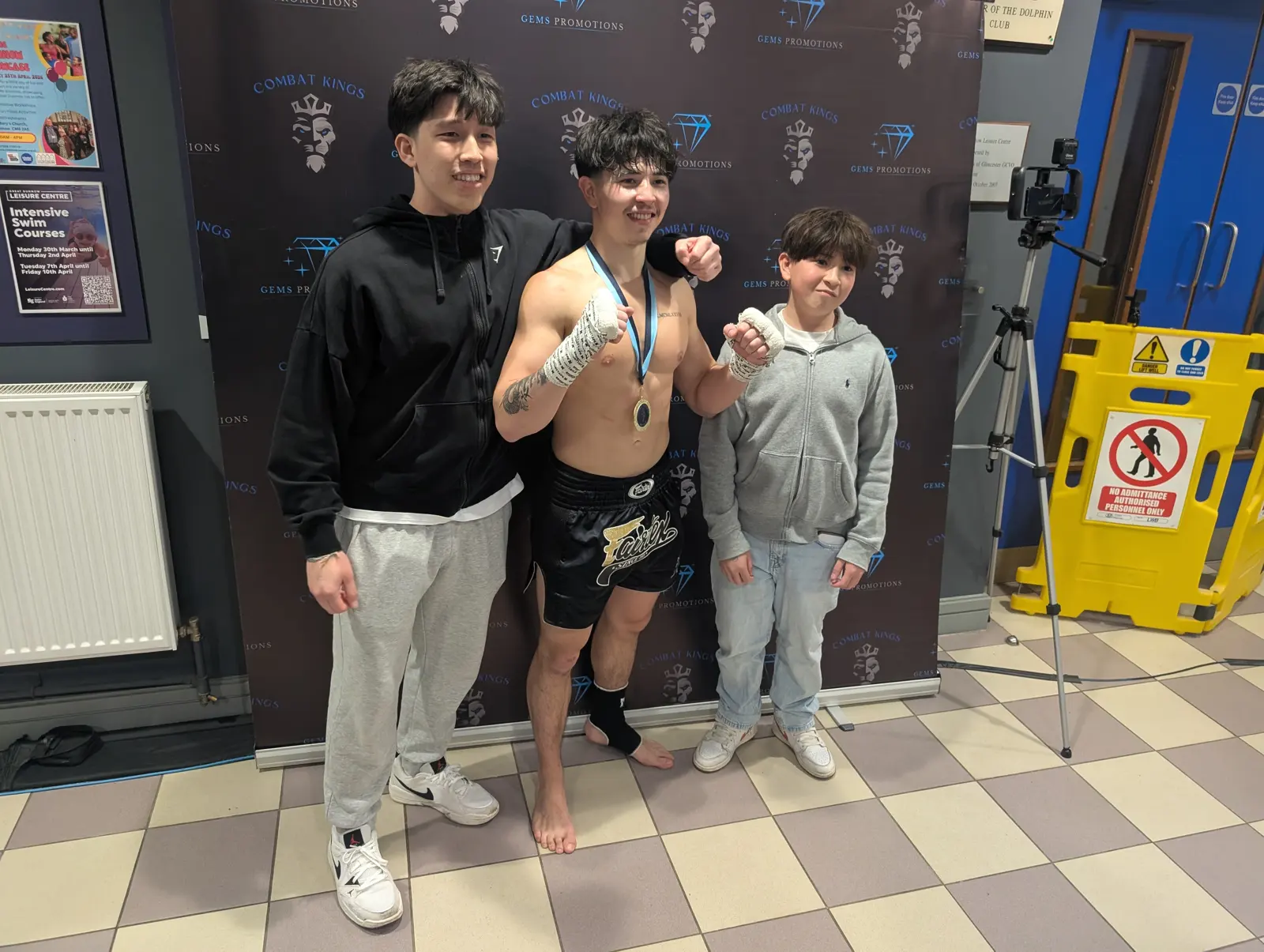 Young fighter with his medal